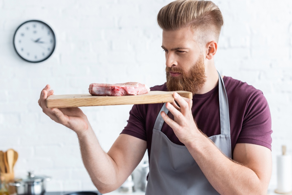 chef-looking-at-meat-during-keto-diet