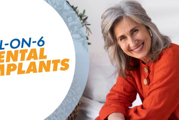 A picture of a woman in a red shirt smiling with a text overlay that says All-on-6 Dental Implants